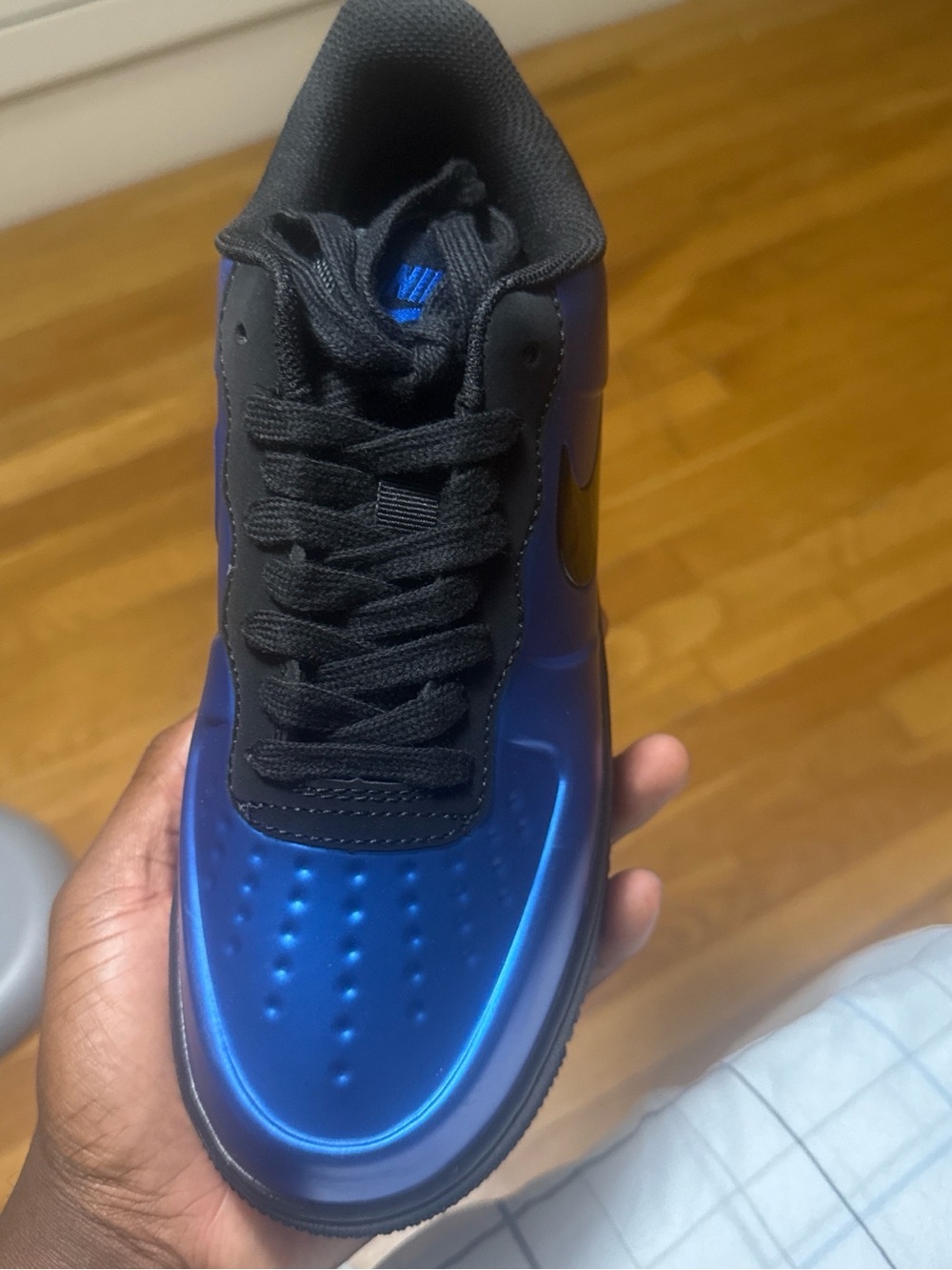 Nike Women’s Metallic Blue Low-Top Sneakers with Black Accents